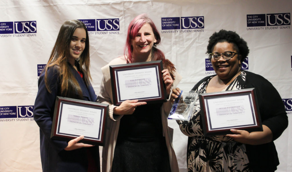 Kiosk members: Yerelyn Nunez, Lisa Sheridan, and Milan Fredricks with awards